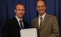 Dr. Brian McFarlin with the ACSM Awards Chair Dr. Paul Davis