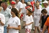 Haley (with the balloon hat) starred in a video promoting the CF walk