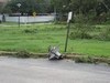 It wasn't a good day to be a lamp-post either. You can also see the downed power lines on Wheeler in the background. (image: Michael Rapp)