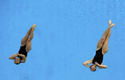 (L-R) Silver medallist Yulia Pakhalina of Russia, gold medallist Guo Jingjing of China and bronze medallist Wu Minxia pose with their medals after the women's 3m springboard diving final at the National Aquatics Center on August 17, 2008.