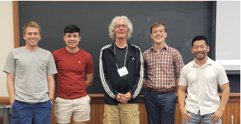 Prof. Phillips with former UH students at RoME 2022.