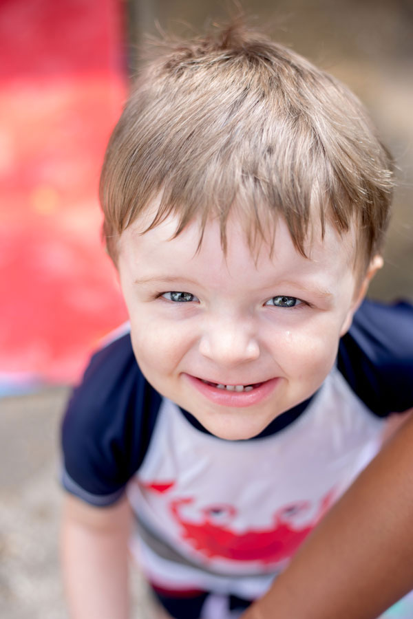 child looking up at camera