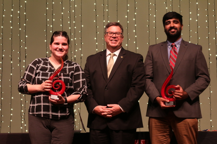 Photo of Legacy Award Winners with Dr. Maxwell