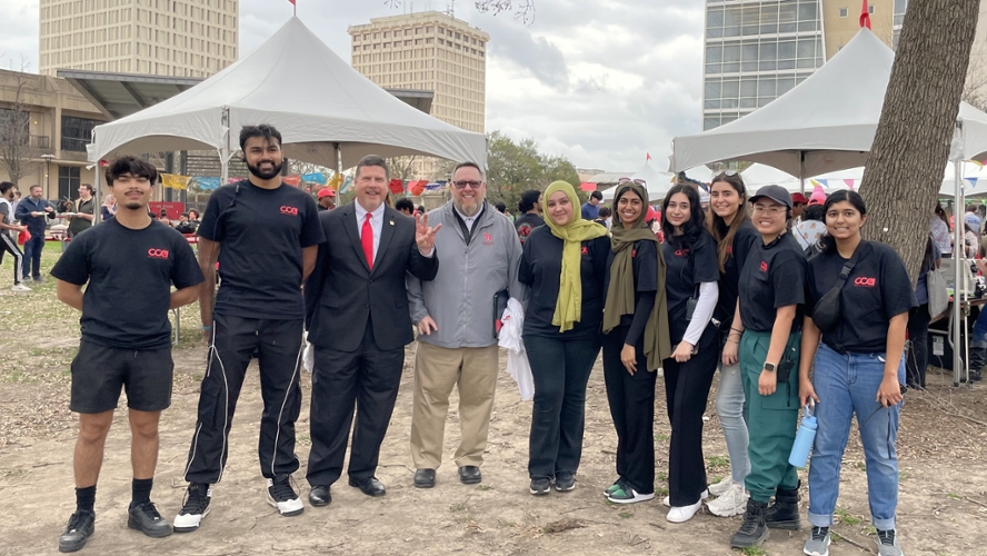 Dr. Paul Kittle and UH staff at the Cultural Taste event