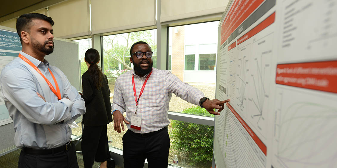 Okeke presenting poster