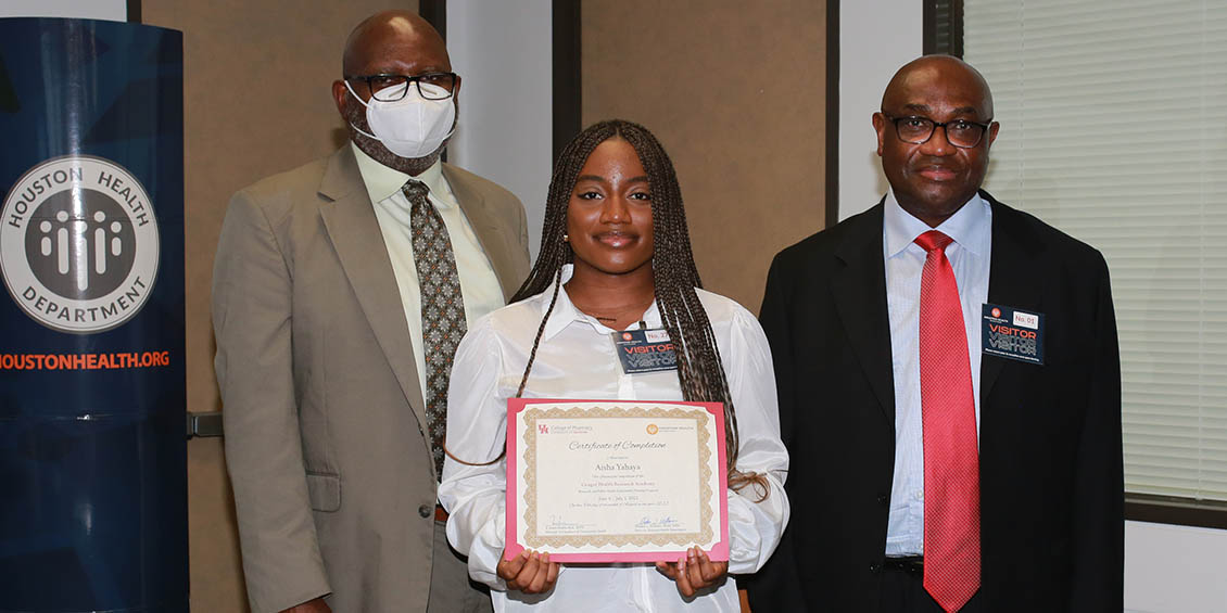 Aisha Yahaya with Essien and HHD director. 