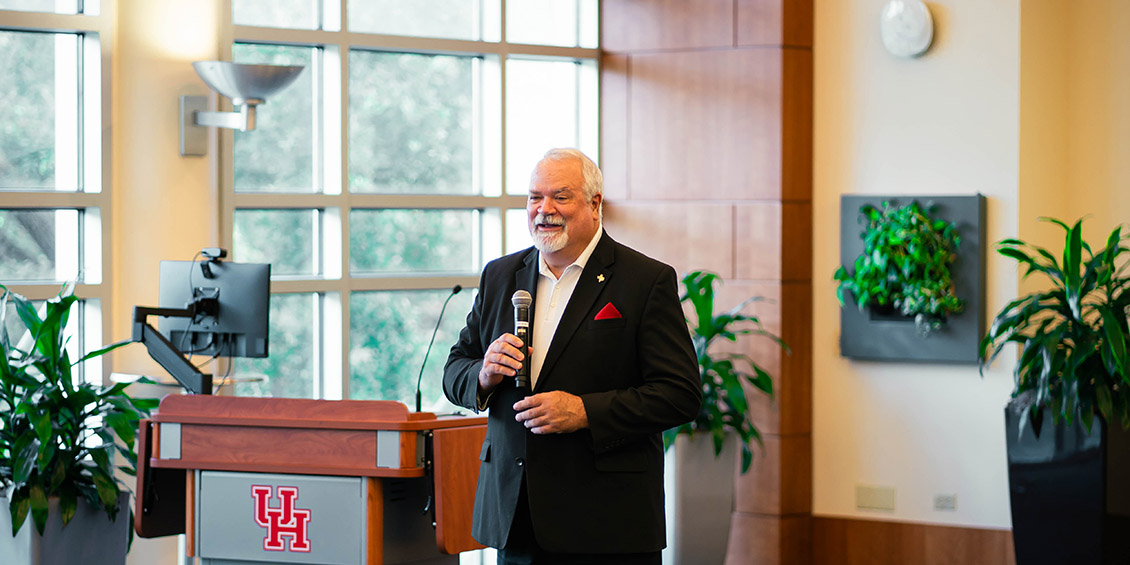 Dean Pritchard speaking to a crowd