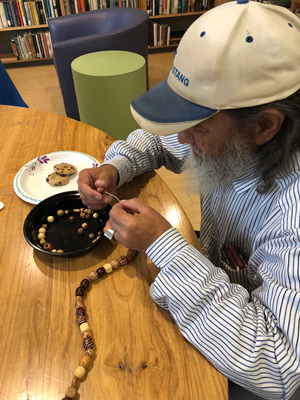 photo of beading class participant