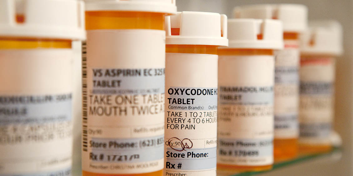 prescription bottles on shelf